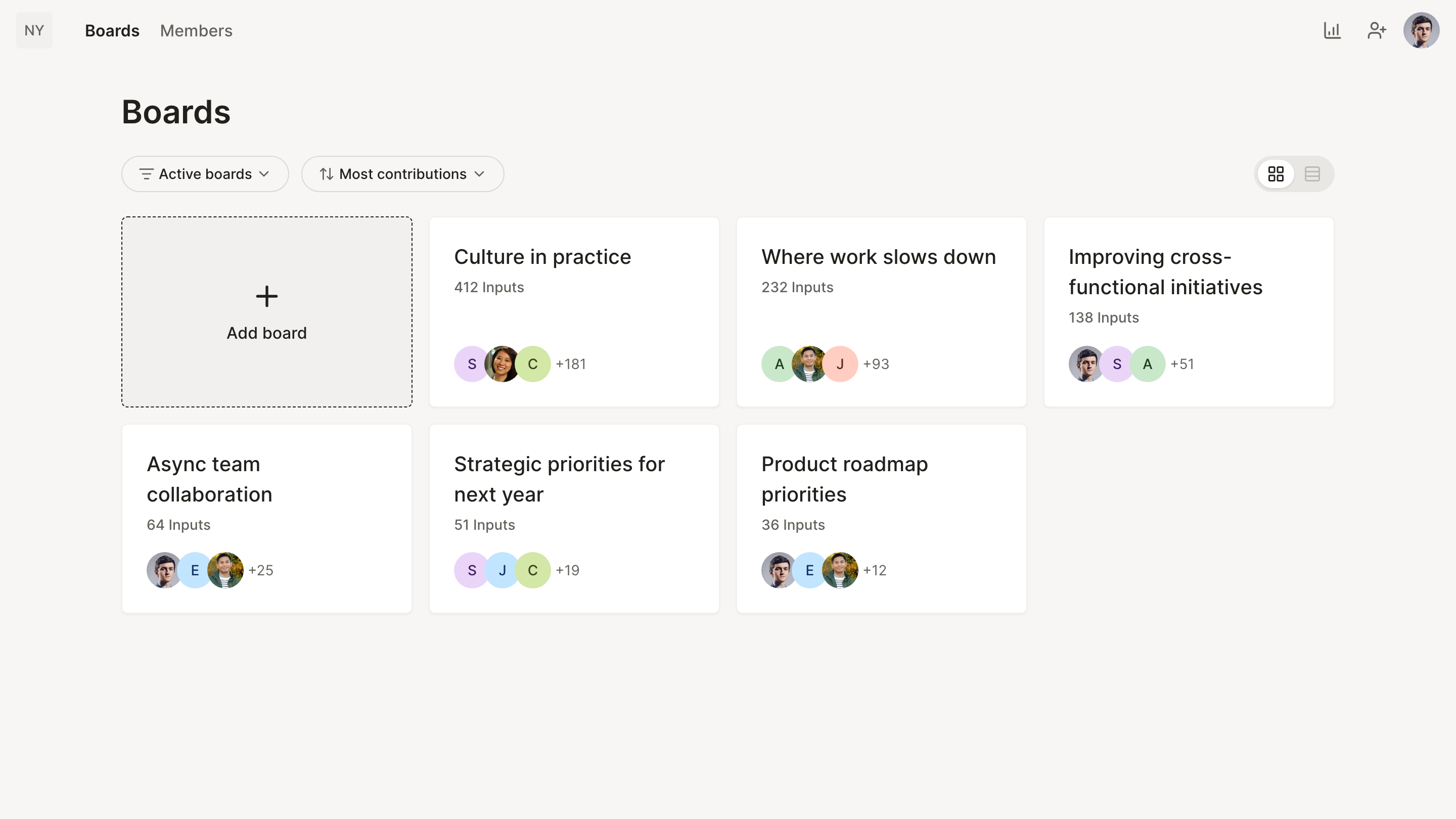 A Nyord workspace overview showing several active boards, each with hundreds of contributions from people across the organization